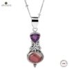 92.5 sterling silver designer necklace adorn with a designer pendant with two purple & peach colored studded amethyst & rhodochrosite natural gemstones